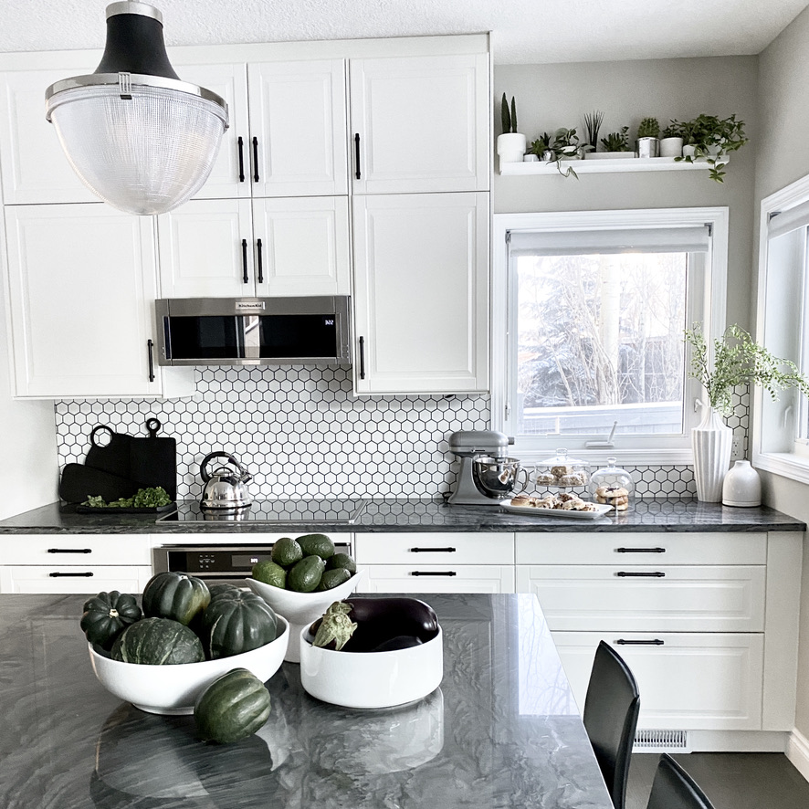honeycomb hex tiles backsplash small white with dark grey gray grout contrast pattern plant ledge grey black white kitchen cabinets ikea benjamin moore revere pewter