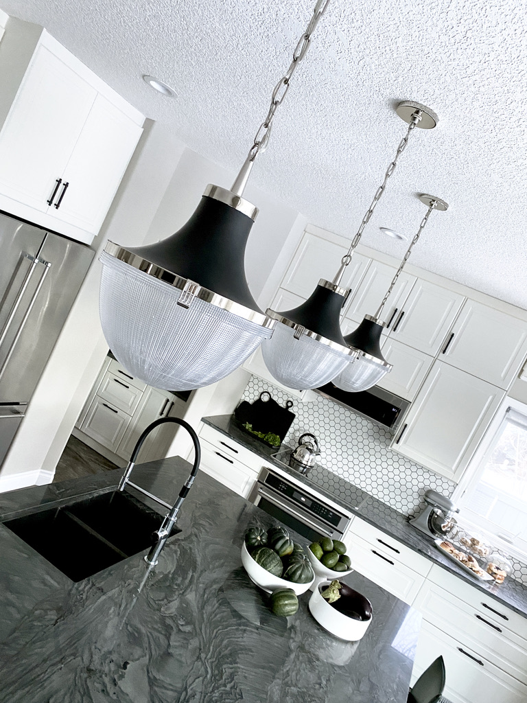 nickel quartzite counter tops countertops stone island statment pendant lights black chrome polished nickel urn shaped high arc black faucet ikea cabinets grey gray white